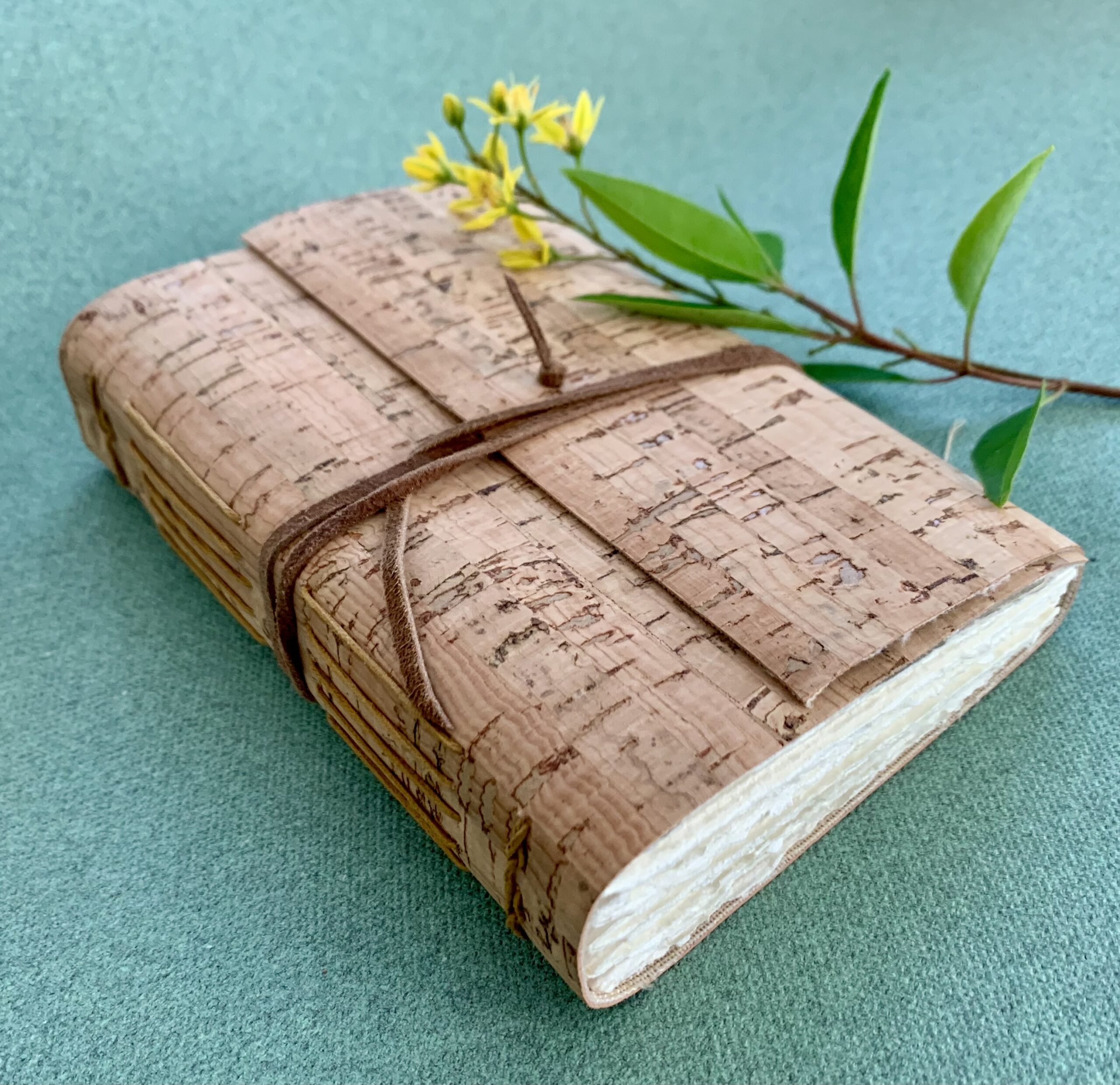 A book with a cork book cover.