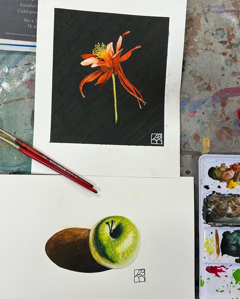 watercolor study of a flower and apple by Kim Morrow.